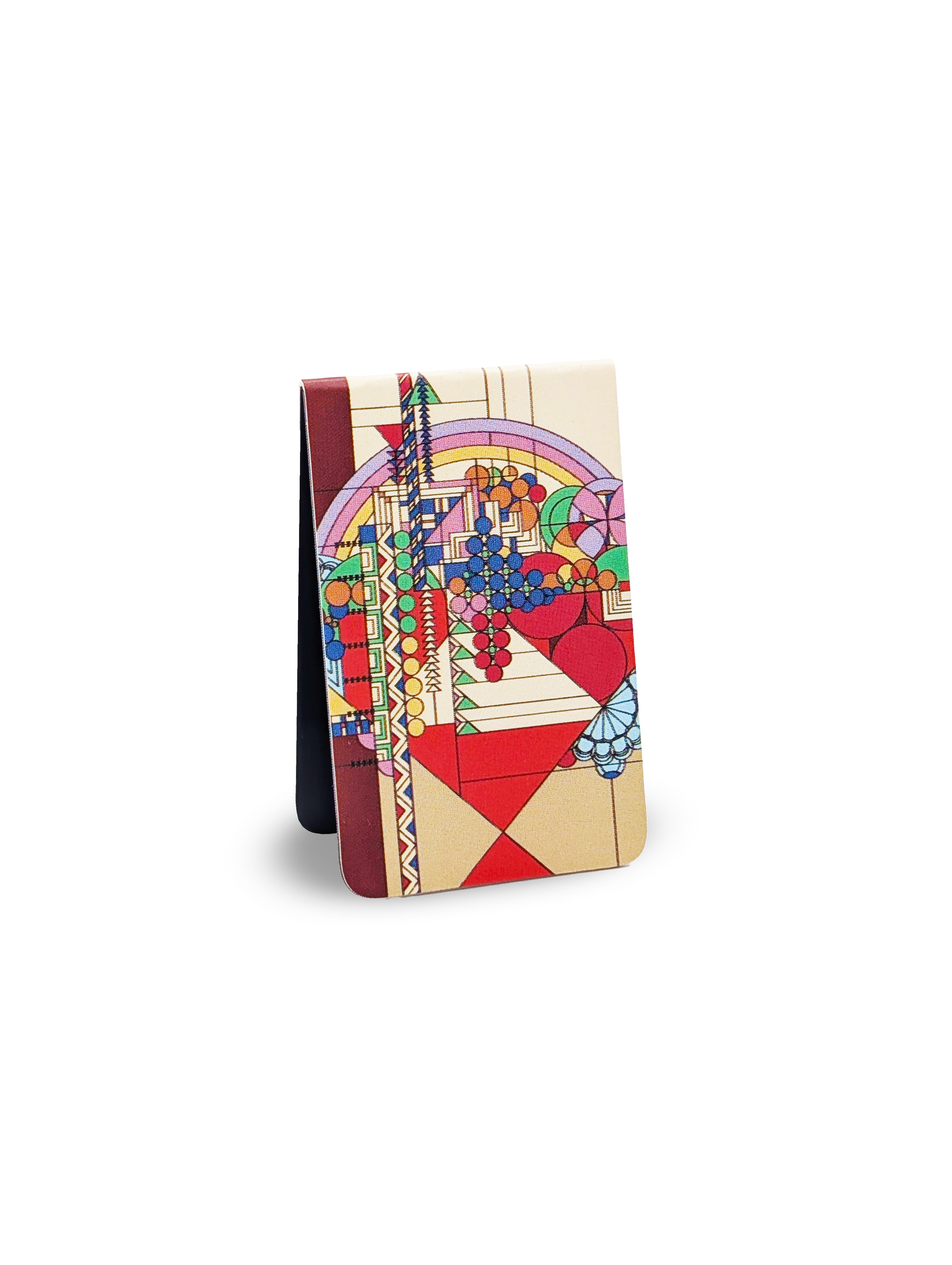 Colorful magnetic bookmark with artistic design on a white background