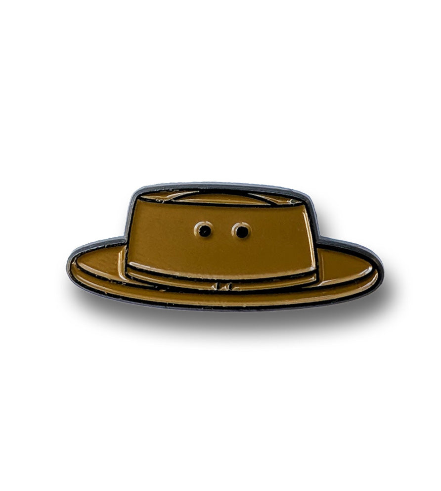 Pin with a design of a hat on a white background