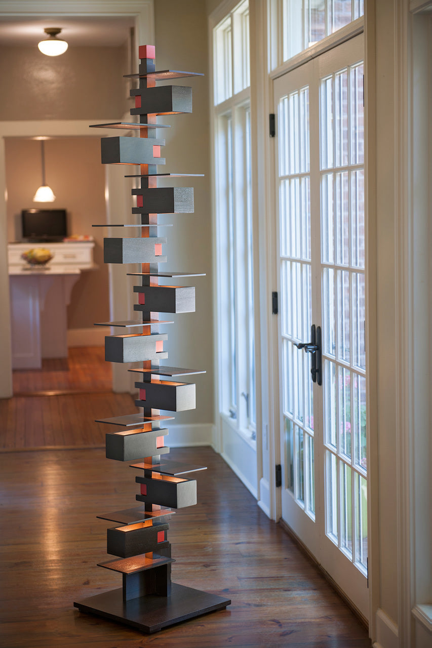 Taliesin Floor Lamp, walnut stain, in home setting