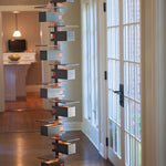 Taliesin Floor Lamp, walnut stain, in home setting
