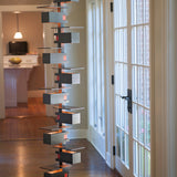 Taliesin Floor Lamp, walnut stain, in home setting