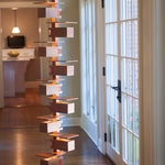 Taliesin Floor Lamp, cherry stain, in home setting.