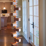 Taliesin Floor Lamp, cherry stain, in home setting.