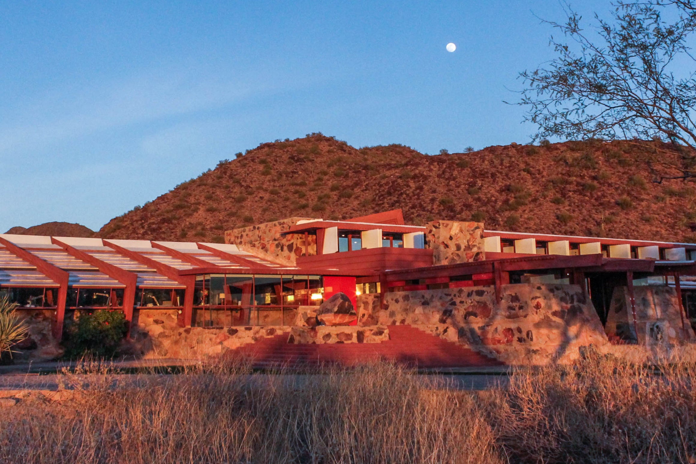 A view of Taliesin West exterior at sun down.