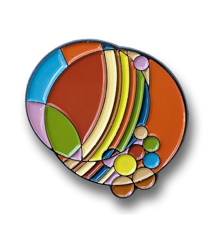 Colorful pin with abstract design on a white background