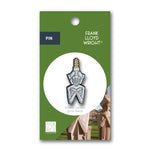 Pin with Frank Lloyd Wright design on a green packaging