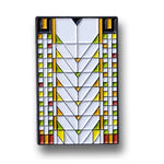 Rectangular stained glass designed pin with geometric pattern on a white background
