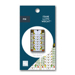 Pin packaging with Frank Lloyd Wright design on a white background