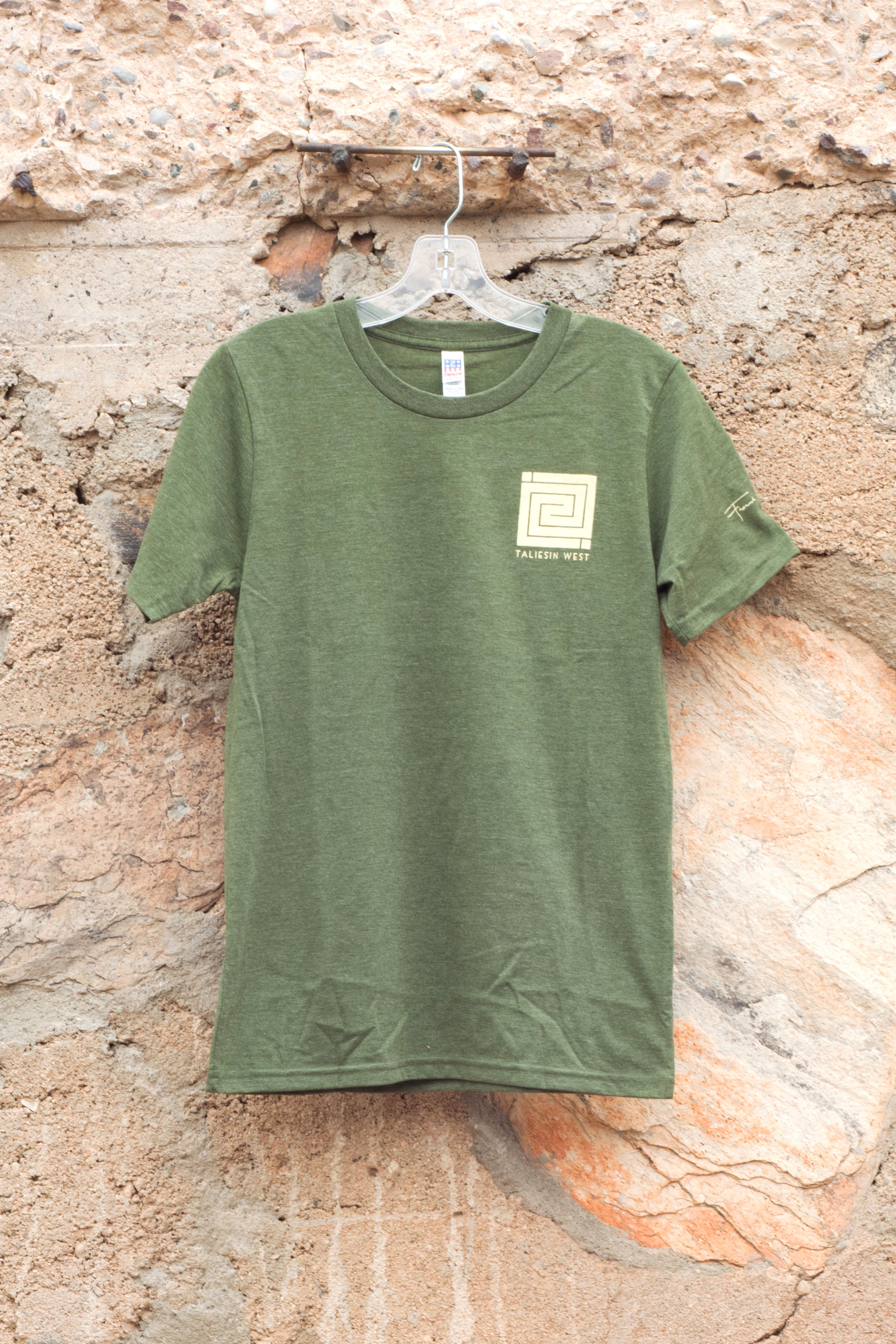 Image shows front of T-shirt with off-white Whirling Arrow on left.