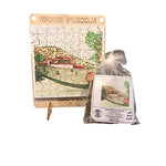 Taliesin West Moon Gate Wood Puzzle, completed puzzle shown with bag and puzzle pieces.