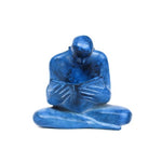 Man Reading Shelf Sculpture by Heloise Crista.